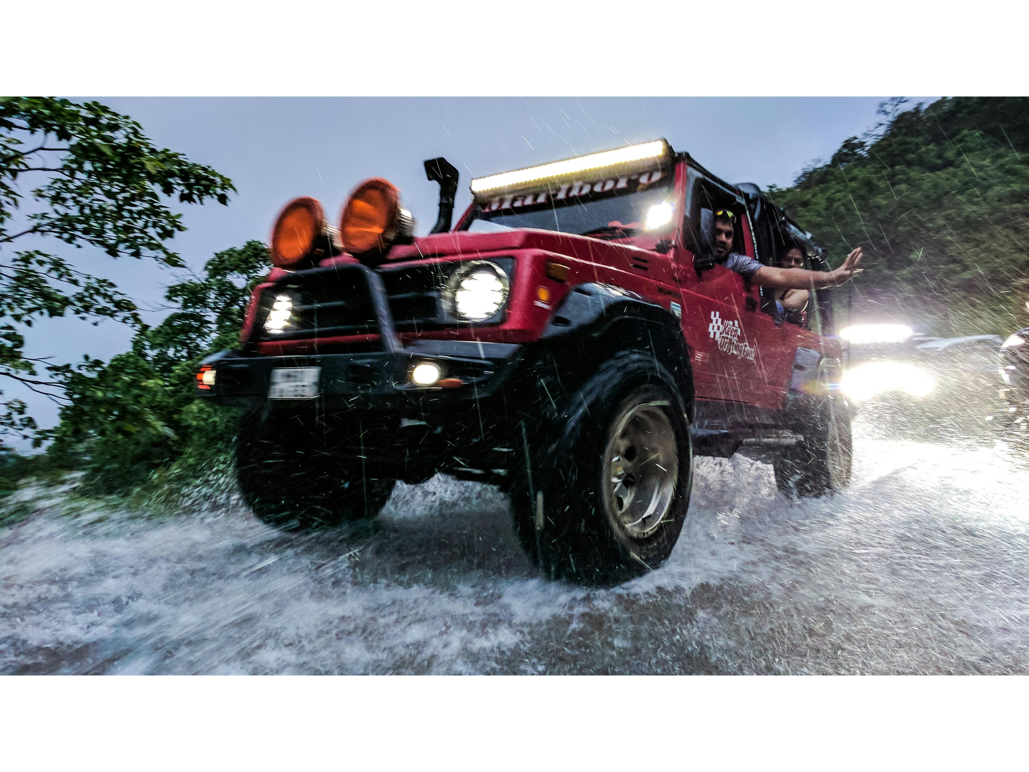 Waving out of a Jeep window