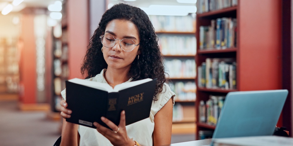 Reading a book at the library