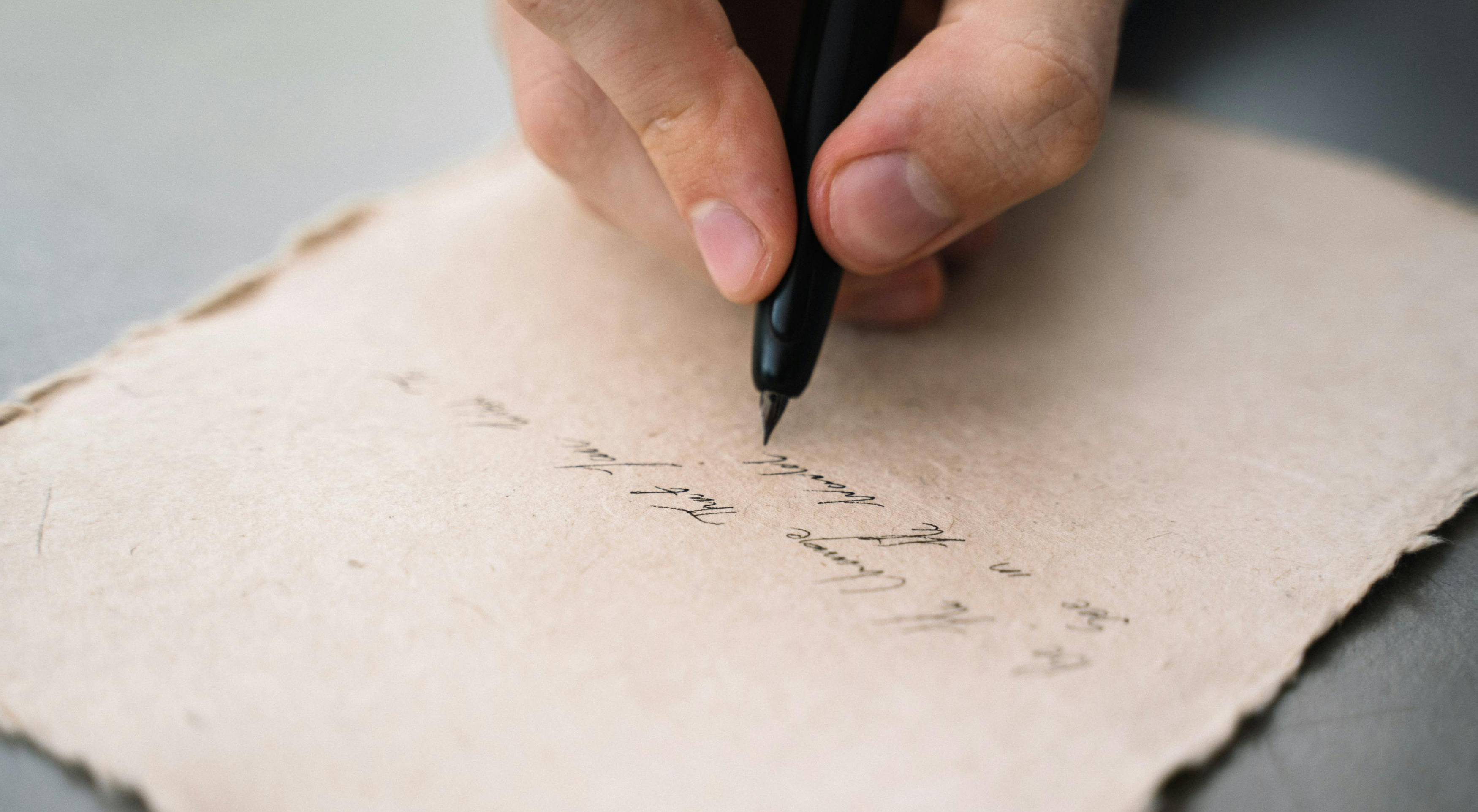 Hand writing on a parchment paper